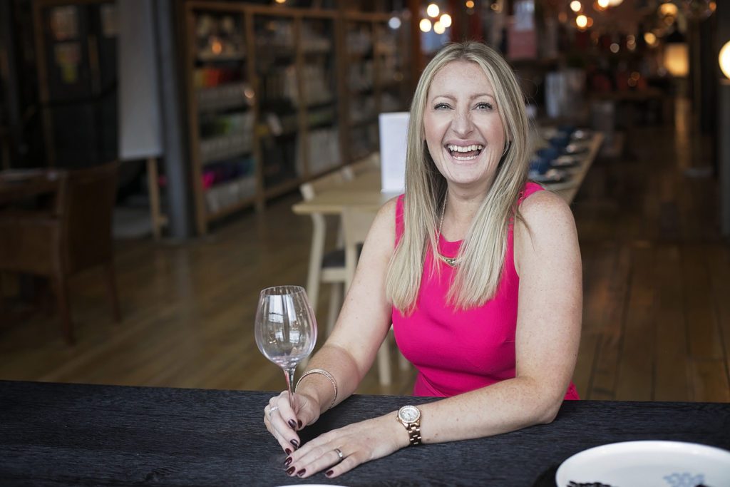 Female business owner having branding photo taken