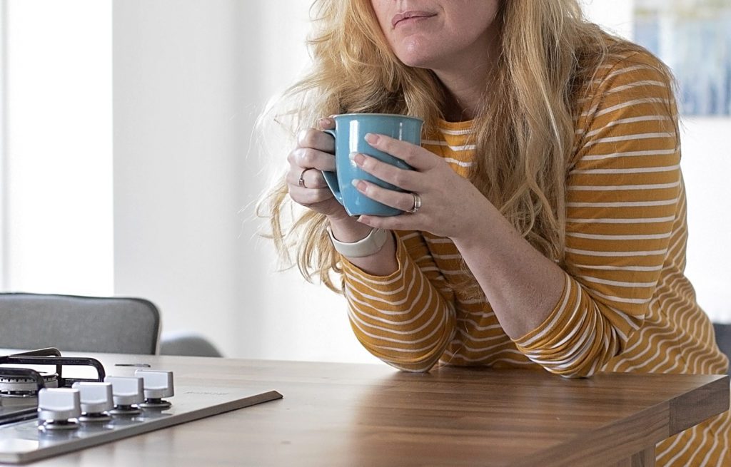 Branding photographer holding cup